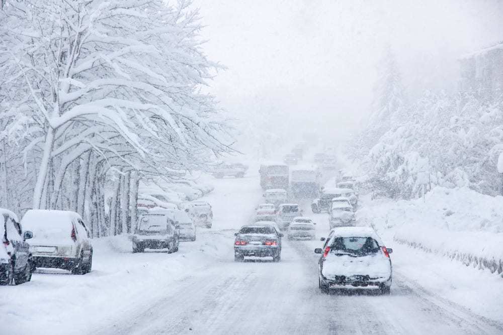 Snowstorm, poor visibility, and lots of traffic