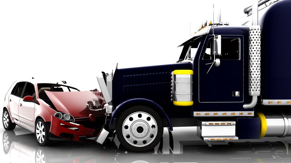 An accident between a red car and a semi-truck