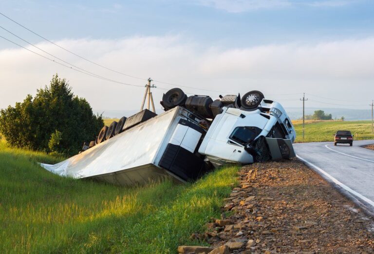 semi truck following accident on side of road