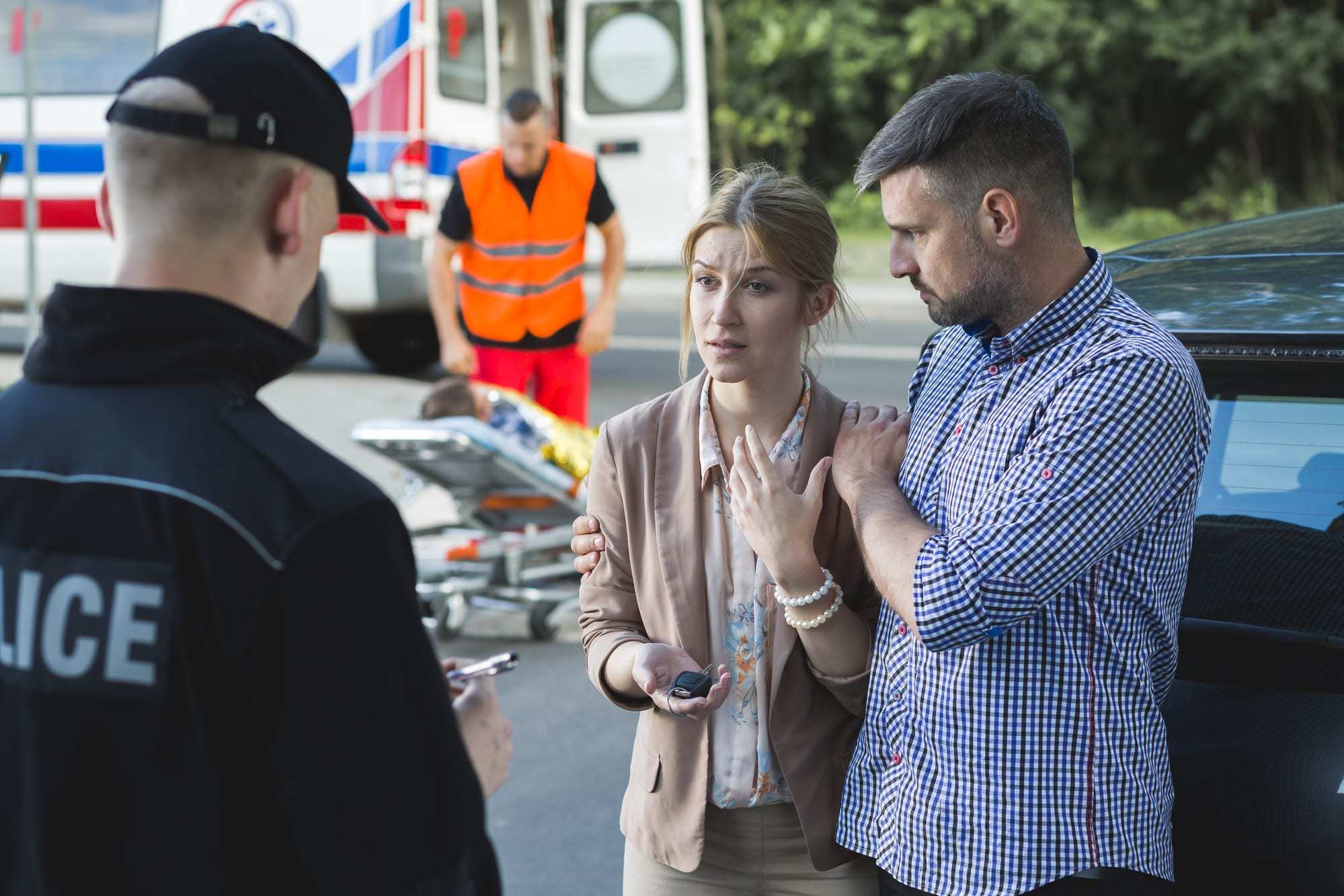 Witnesses talking to police officer