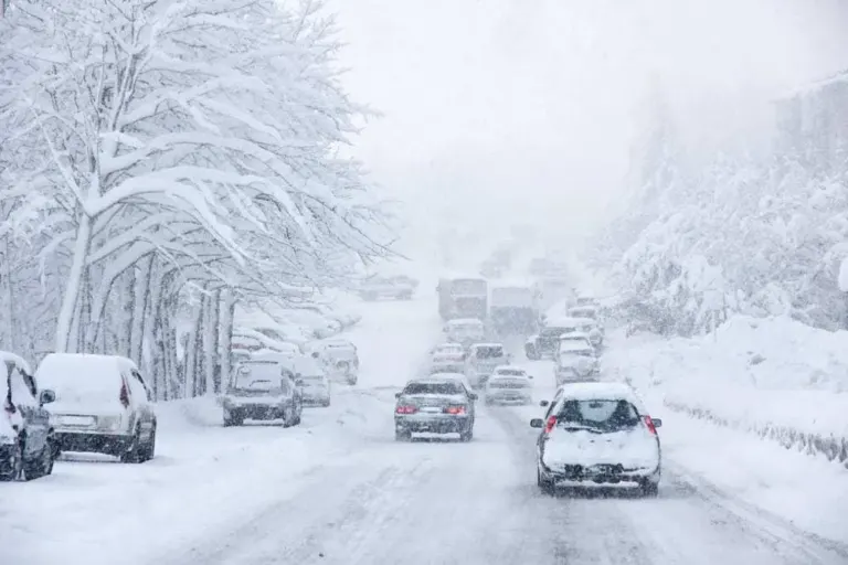 Snowstorm, poor visibility, and lots of traffic