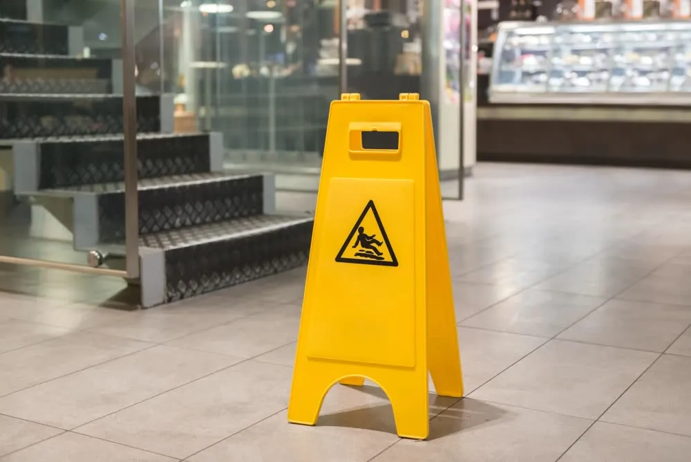 Slip and fall caution sign in a food market