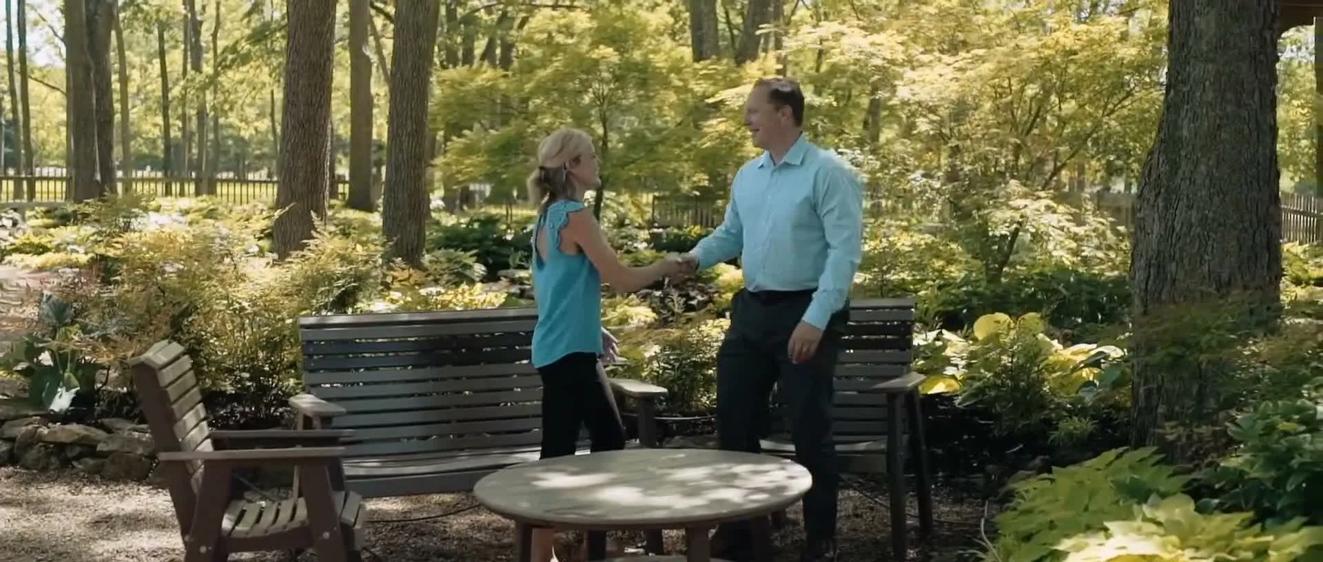 Bryan Musgrave shaking hands with a client, from the firm’s video