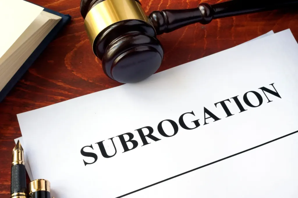 subrogation typed on paper, gavel beside